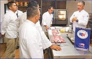 Employees of foodservice companies in Honduras receive training on the preparation and cooking of U.S. St. Louis-style pork r