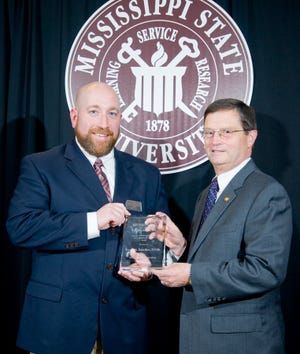 Veterinarian at Iowa State Honored As Distinguished Alumni