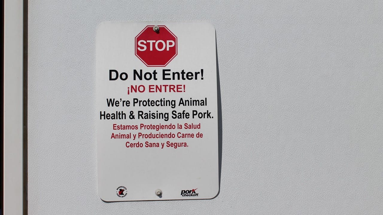 Lessons learned from 87 swine outbreak investigations NPB Biosecurity Stop Sign on Door