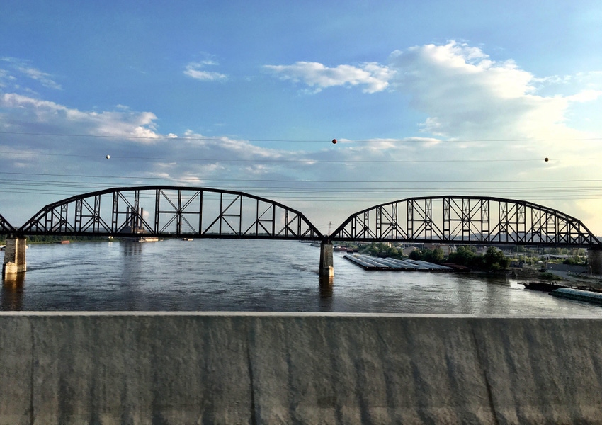 mississippi river barge grain barge bridge st. louis