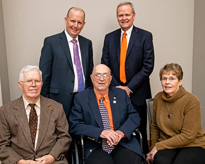 K.T. Wright, center, surrounded by (clockwise from left) LeRoy Biehl, Jim Lowe, Larry Firkins, and Betty Wright, K.T.'s wife, at the Dec. 5 event.