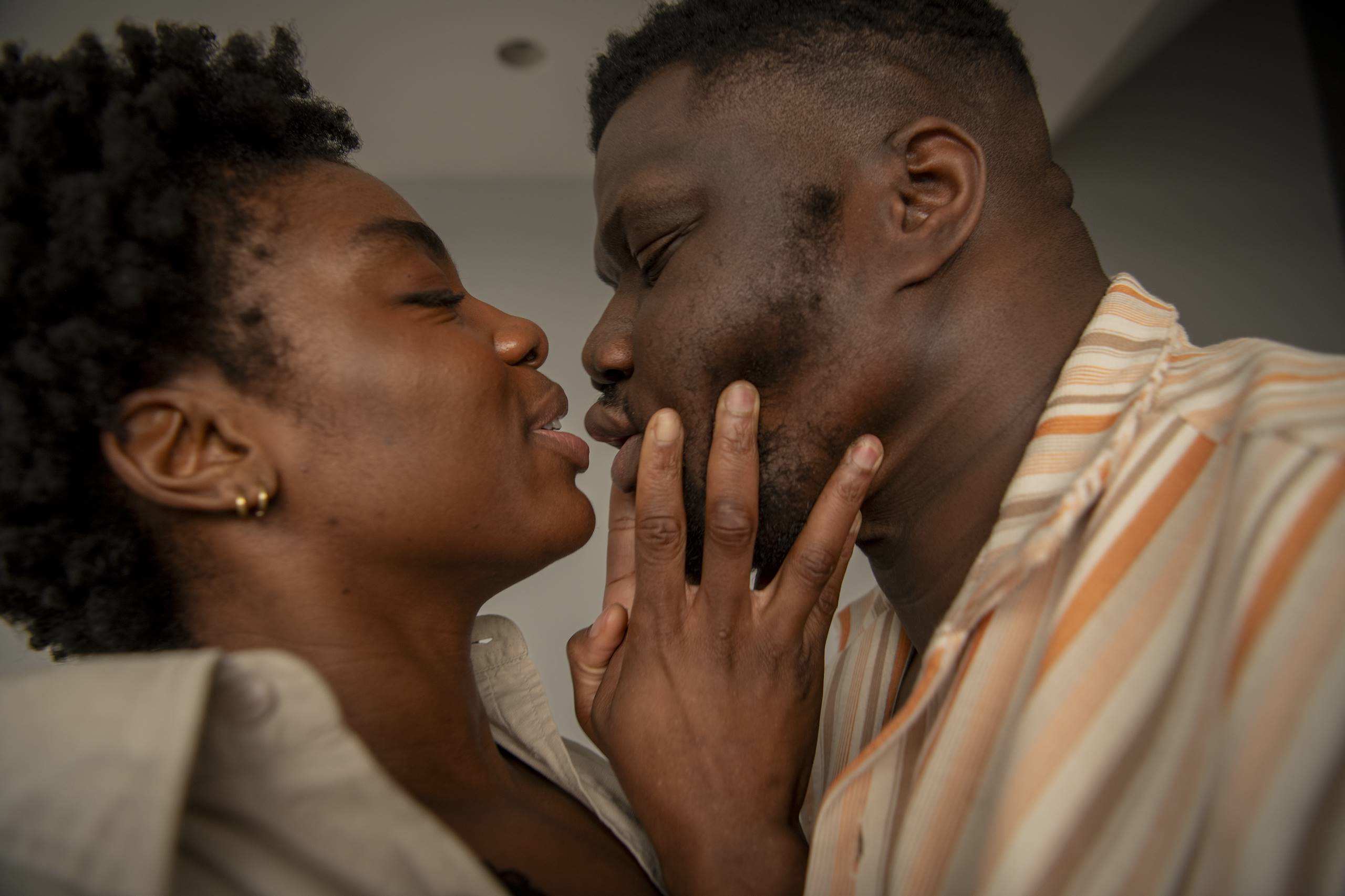 A couple about to kiss