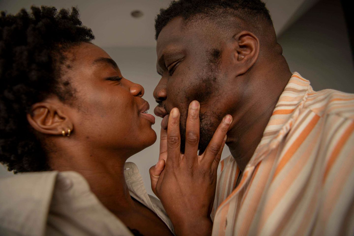 A couple about to kiss