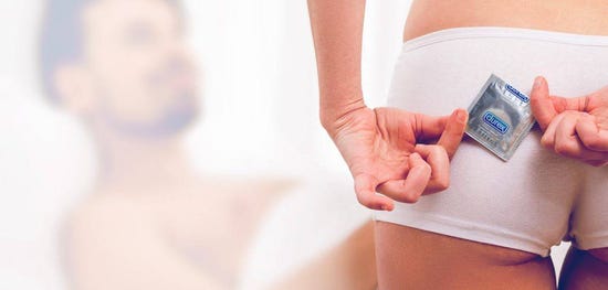 Couvrir un préservatif