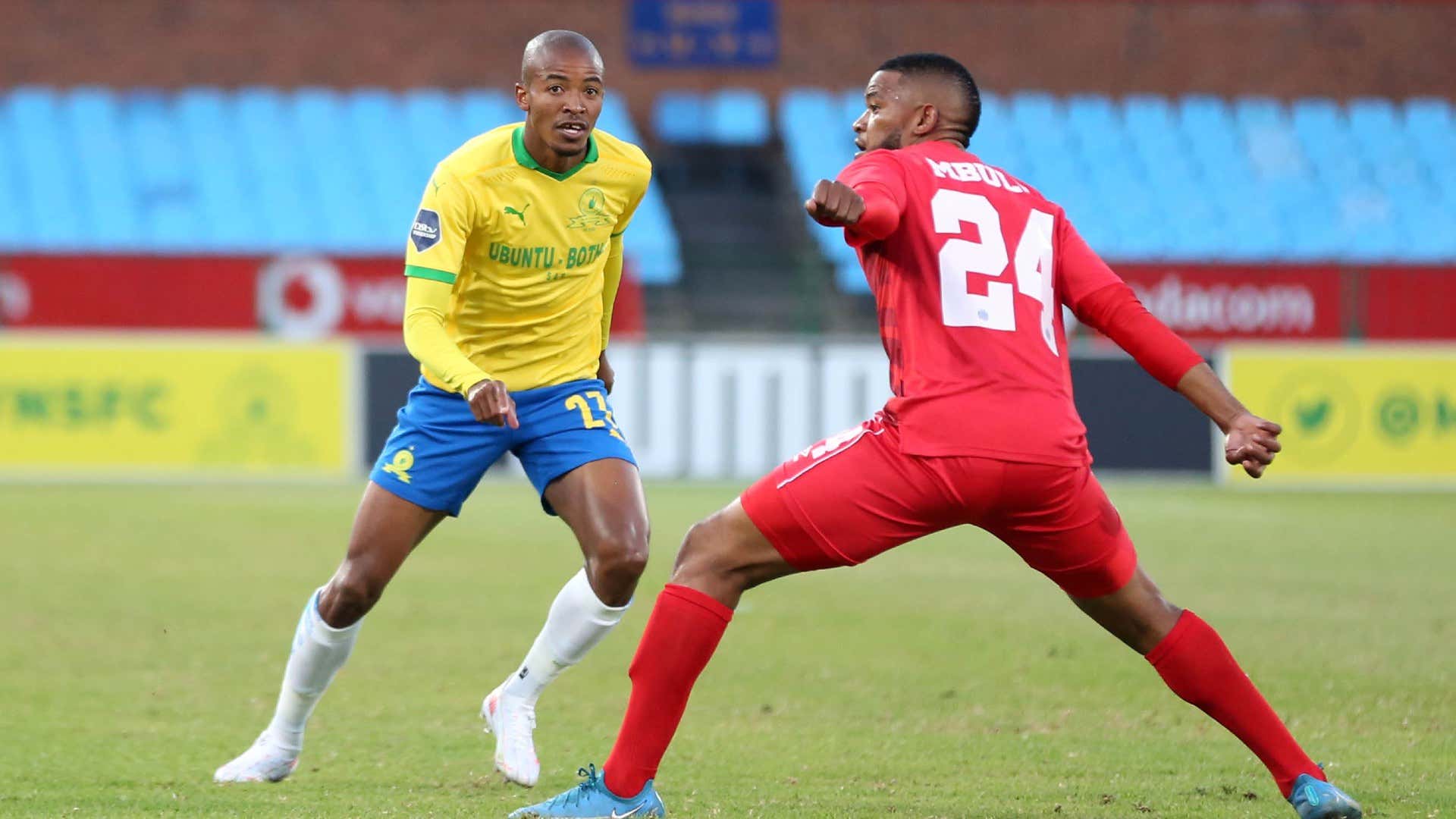 Thapelo Morena of Mamelodi Sundowns challenged by Sipho Mbule of Supersport United.