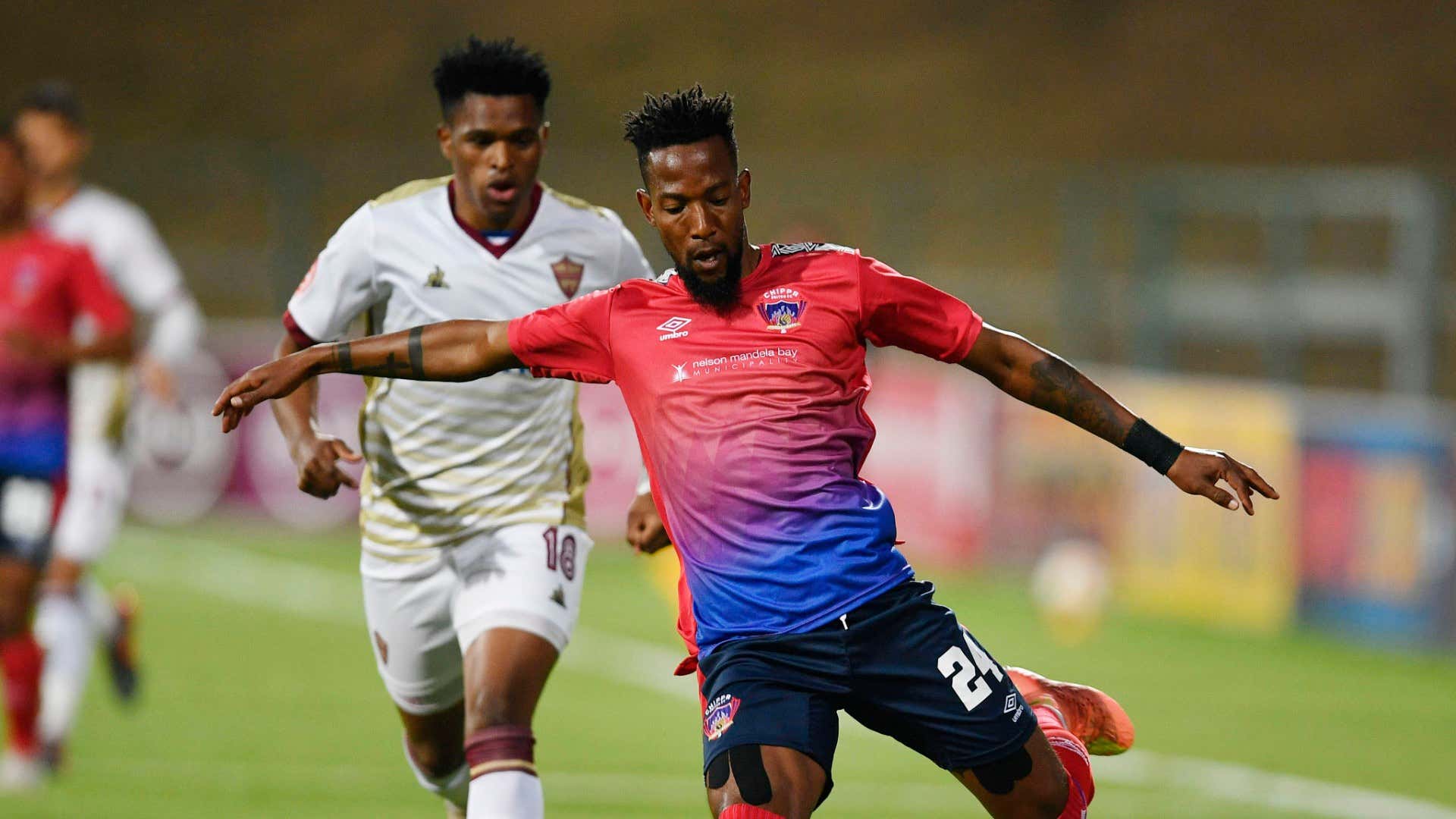 Diamond Thopola of Chippa United challenged by Lelethu Skelem of Stellenbosch FC, August 2020
