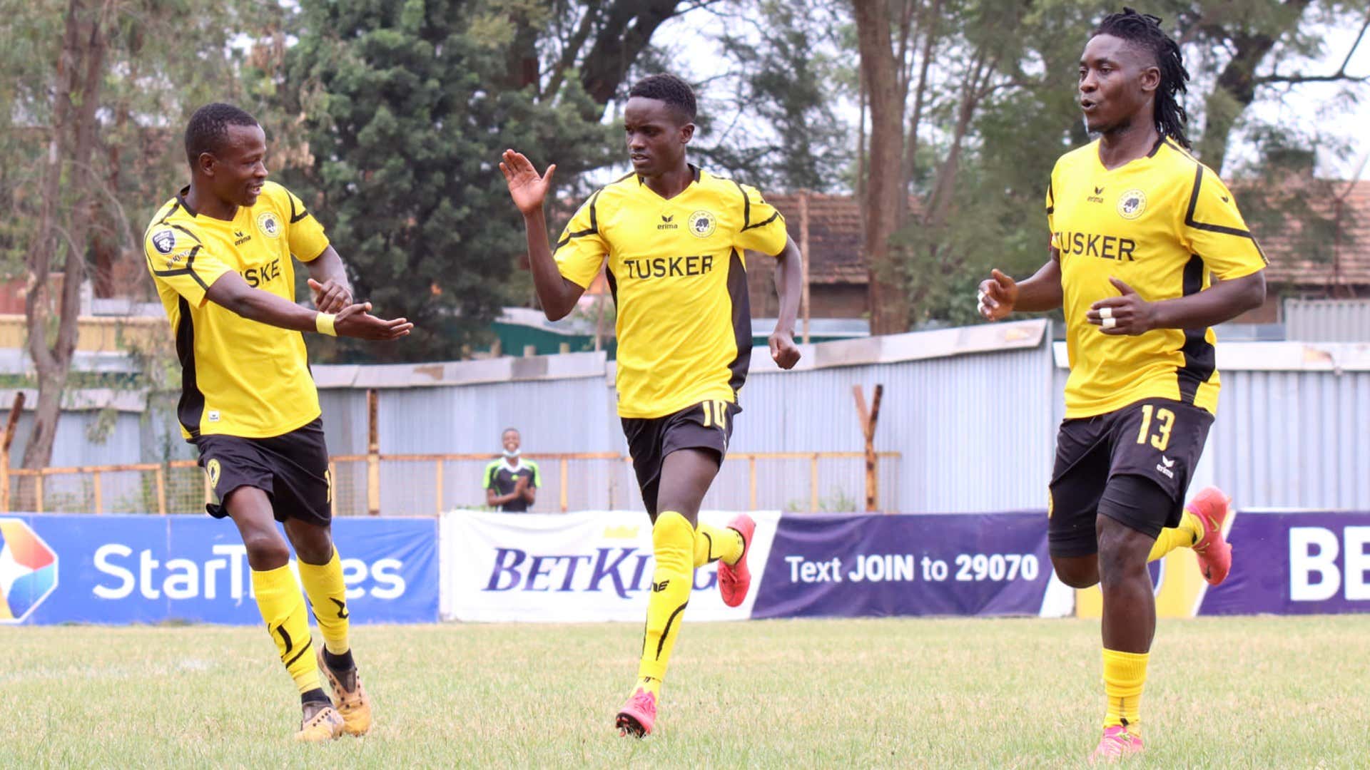 Tusker midfielder Michael Madoya and Hashim Sempala.