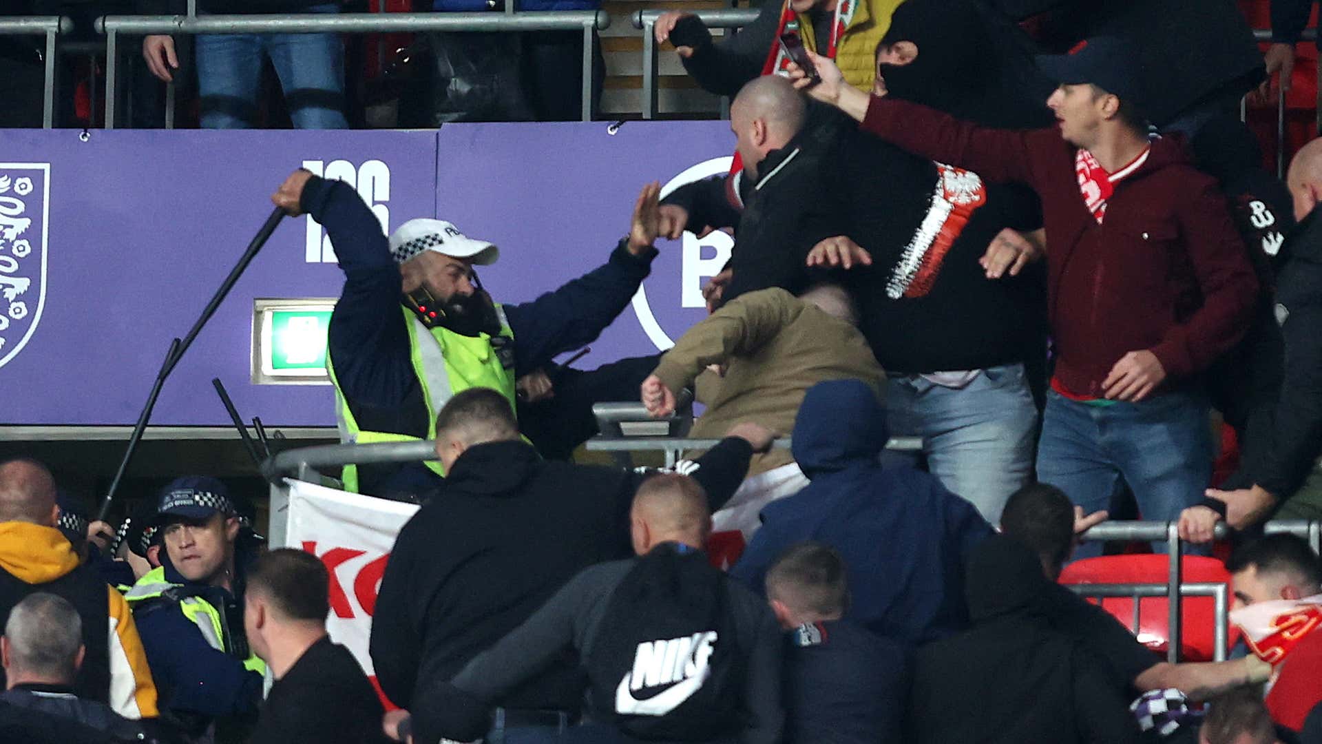 Hungary fans clash with police after 'racially aggravated' offence during England match