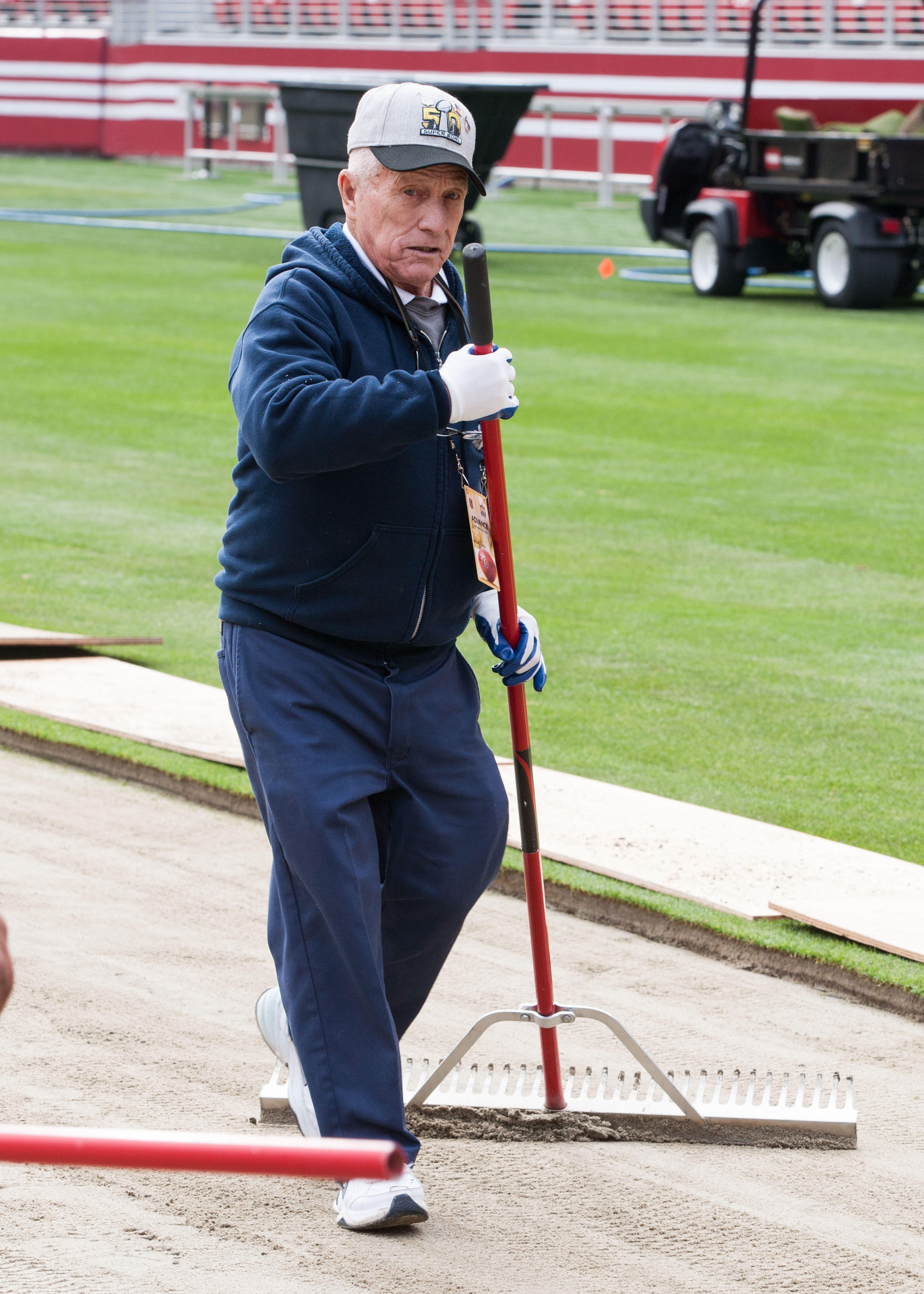 Longtime KC groundskeeper George Toma shows off his Super Bowl LIV