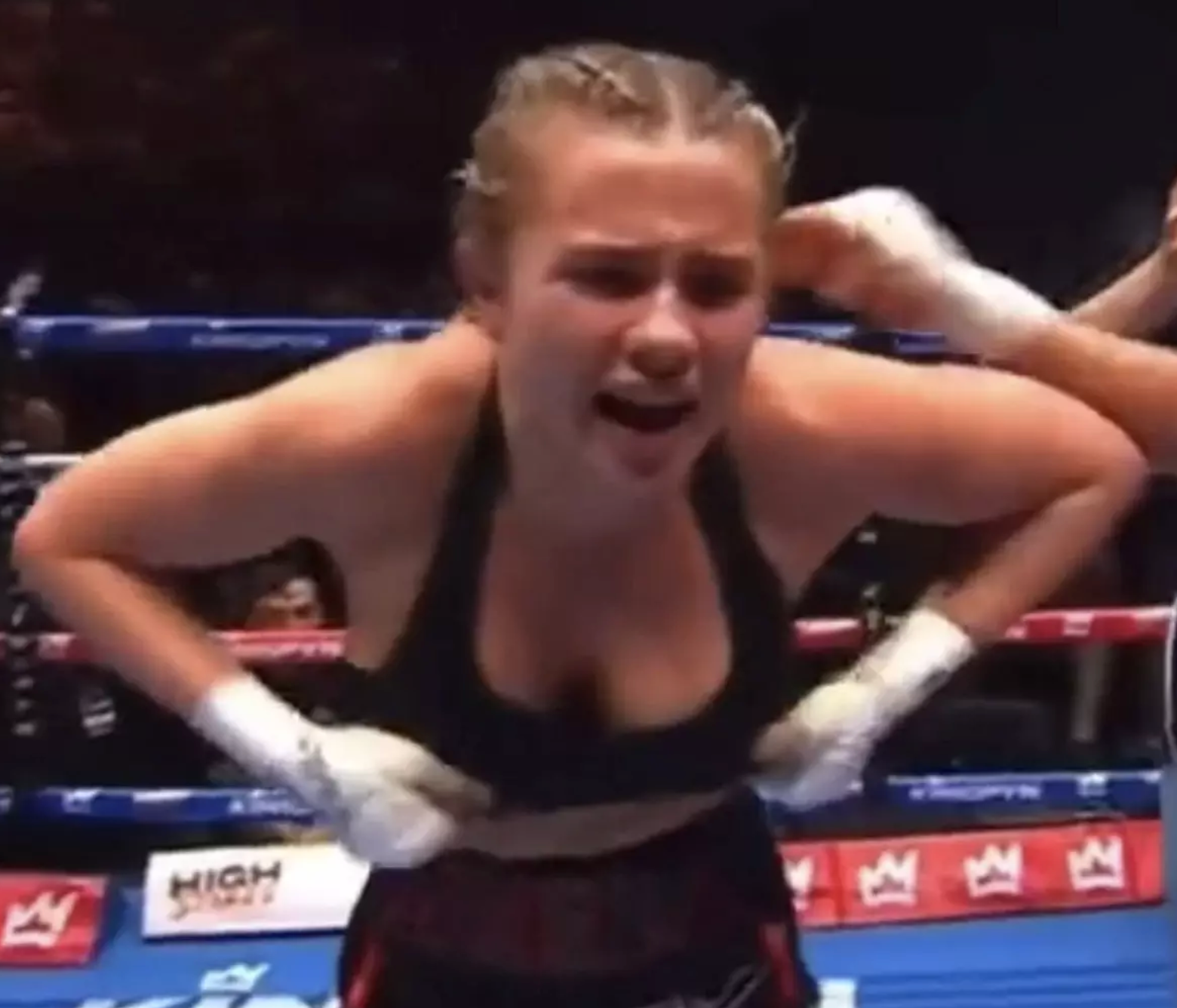 Boxer Daniella Hemsley has been banned from final after she lifted up her top in celebration