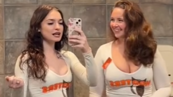 Hooters faces backlash after viral video shows staff have to buy their own  tights from vending machine