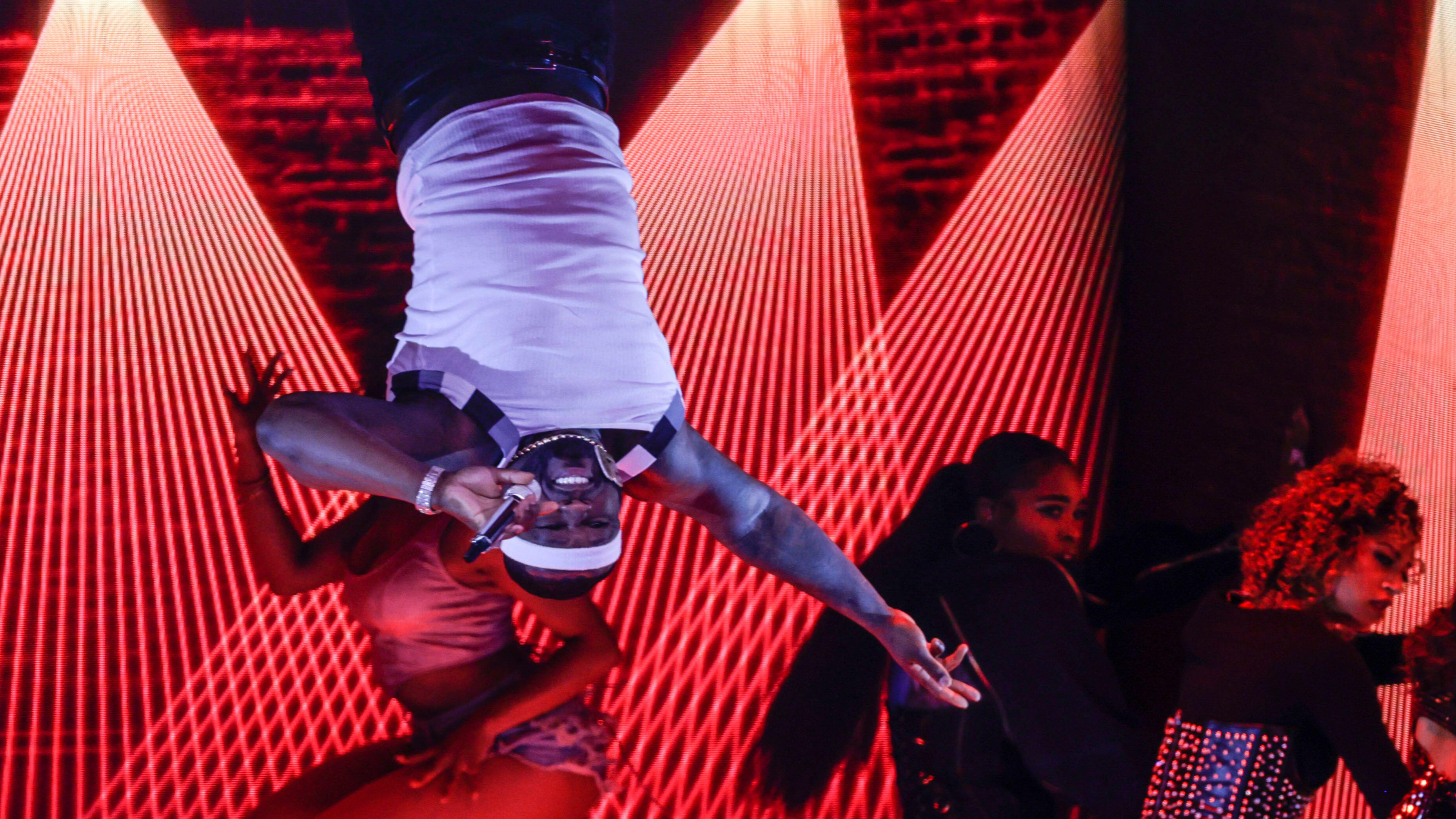 The Real Reason 50 Cent Was Upside Down In The Super Bowl Halftime