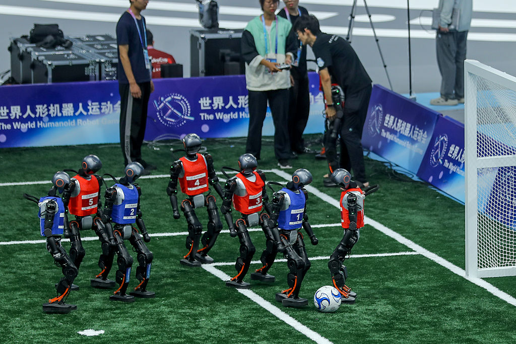 Bizarre moment humanoid 'face-plants' as 'Robot Olympics