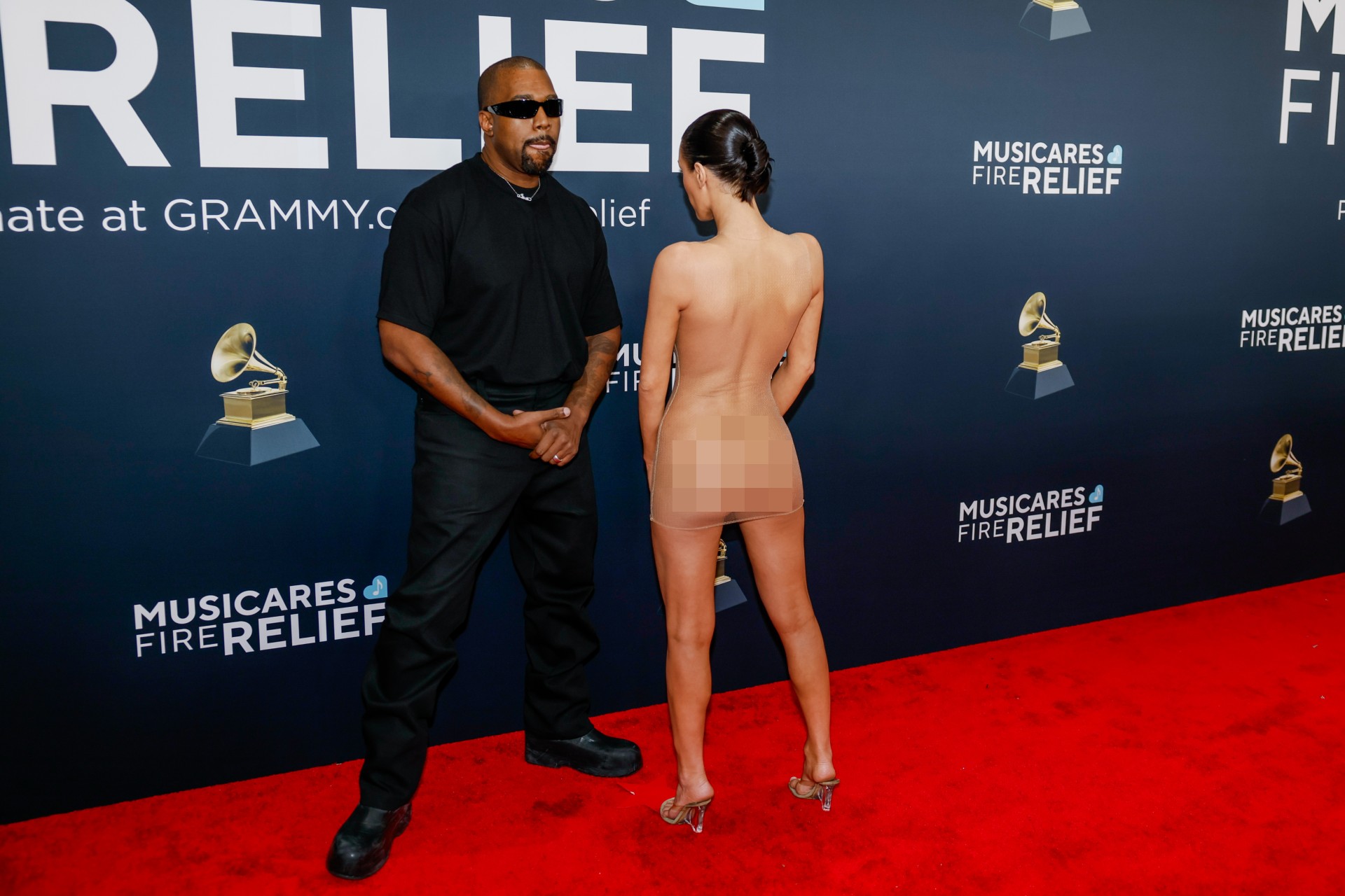 why does bianca censori dress the way she does Bianca Censori suffers a wardrobe malfunction in tiny pink mini dress with plunging neckline on outing with her mom