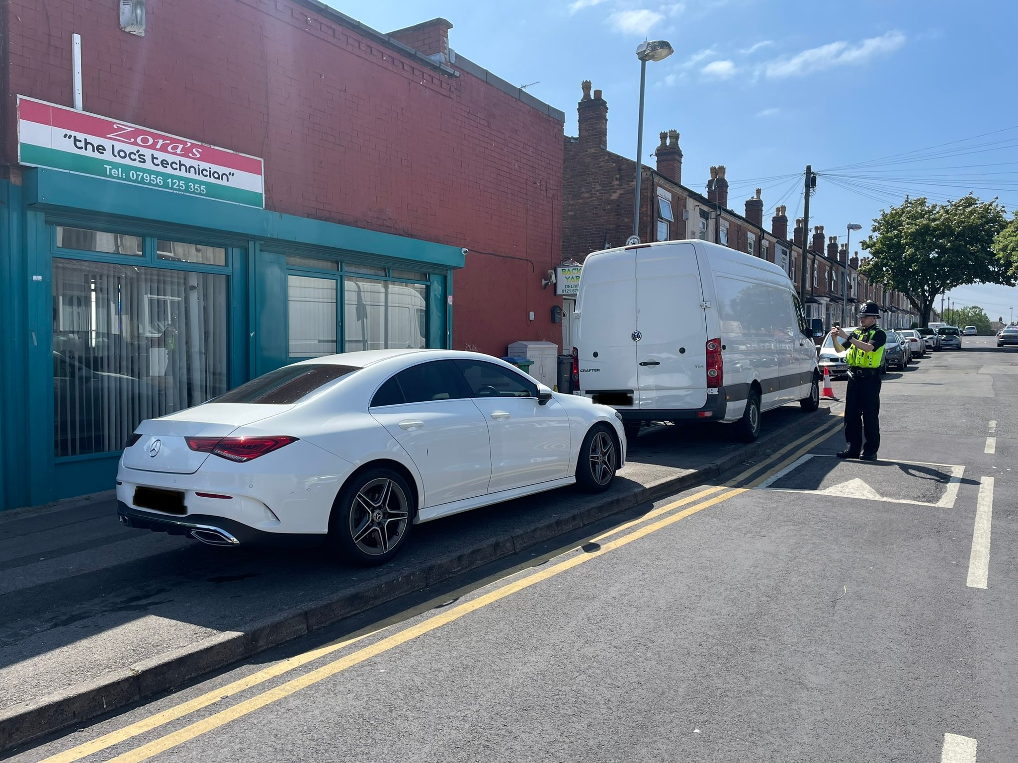 Technically they're not parked on a double yellow, but this is not the right way to do things. Credit: Twitter/@SohoRoadWMP