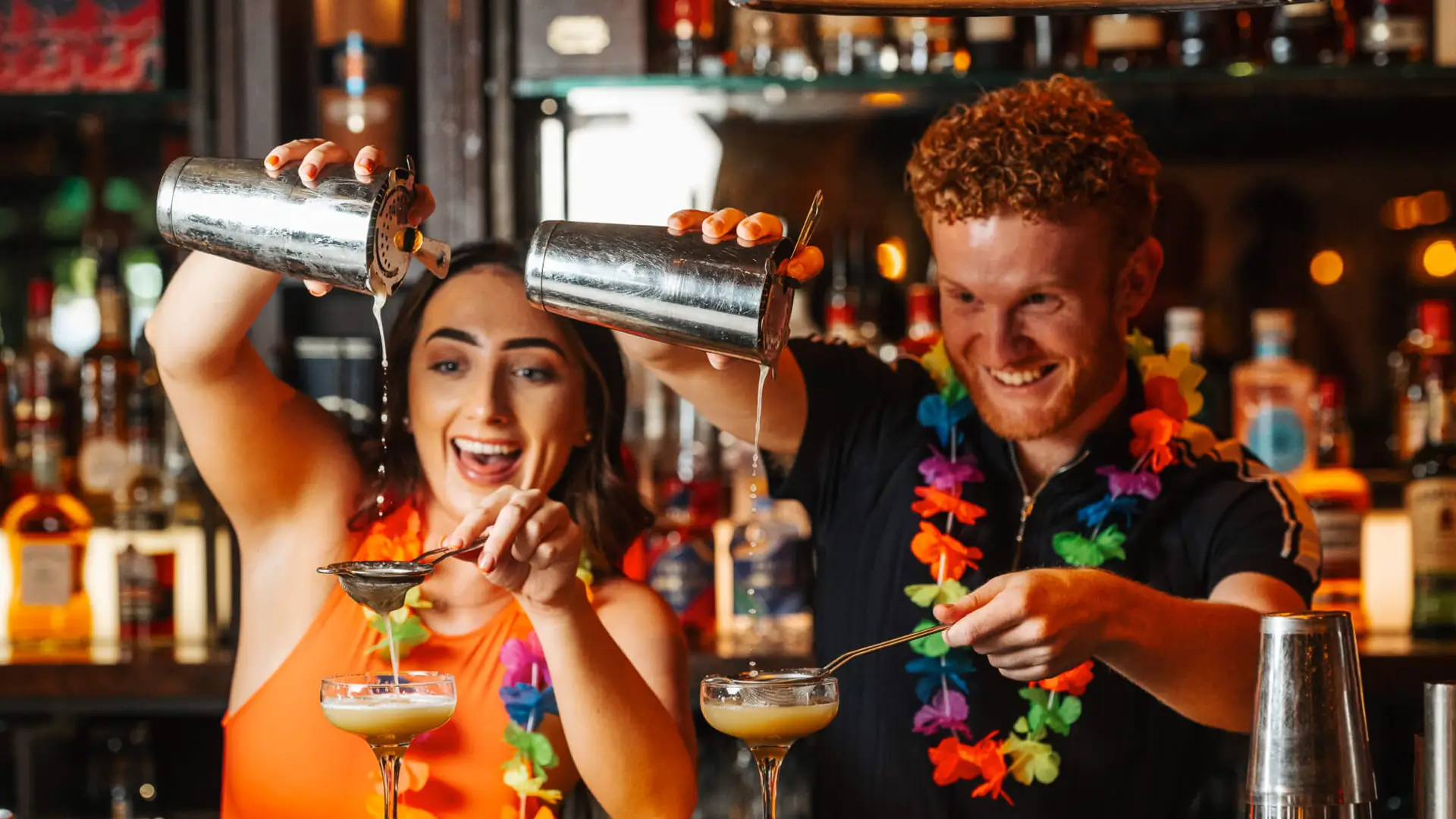 People enjoying a cocktail making class
