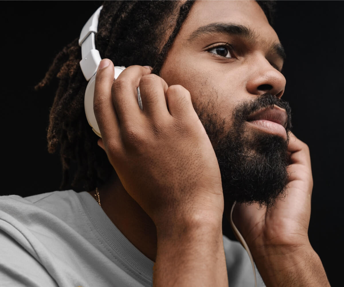 A man listening to music through headphones