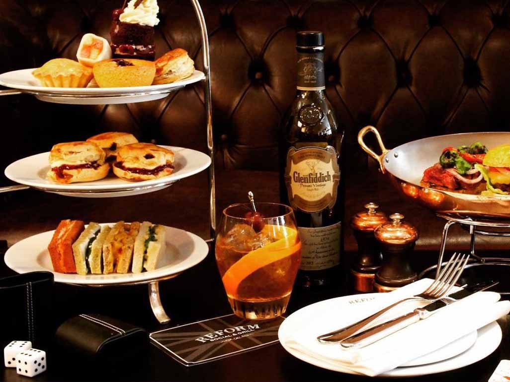 Afternoon tea at the Mandeville Hotel with a selection of scones, sandwiches and cakes