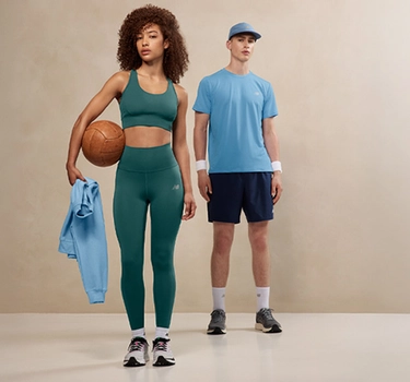 A young woman and men standing and wearing trainers, sneakers from New Balance.