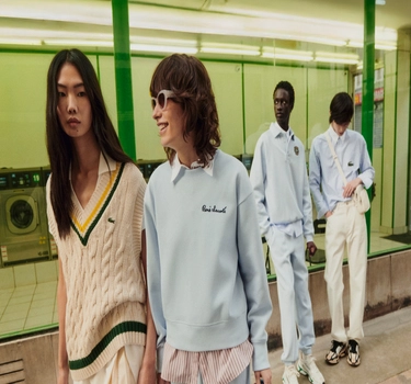 2 women and 2 man standing outside railway station lacoste