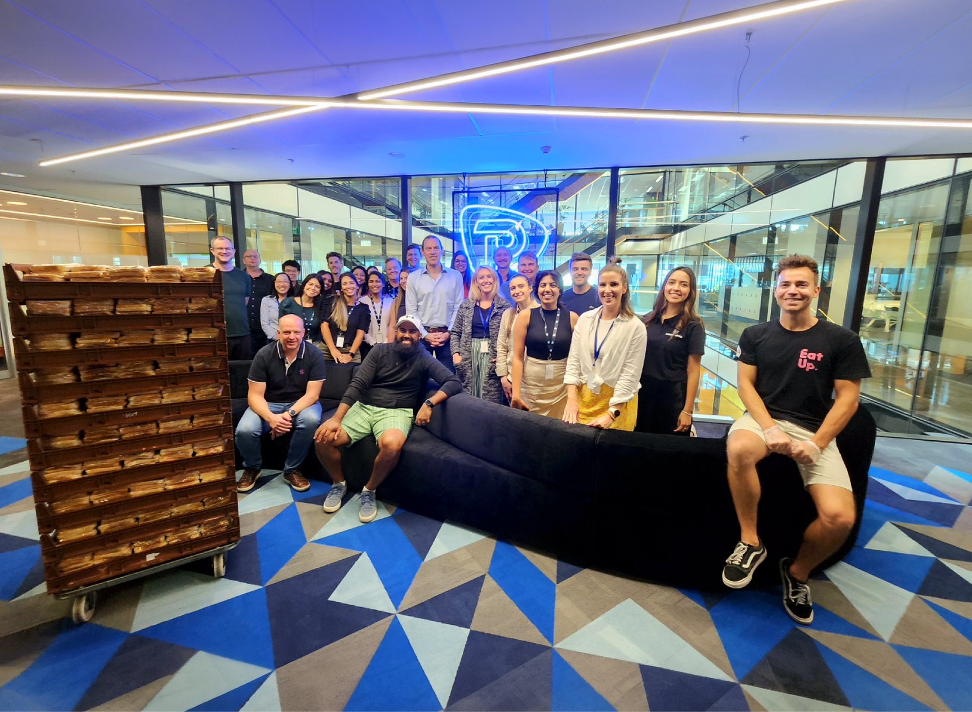 Pepperstone team photo in the office