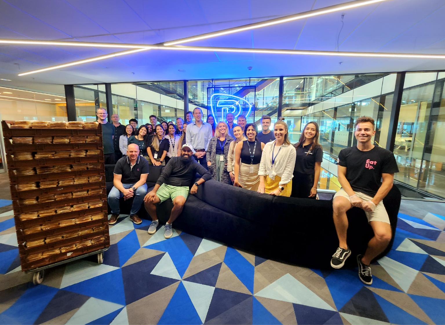 Pepperstone team photo in the office