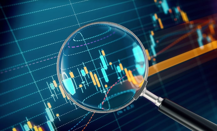 magnifying glass on trading data.jpg