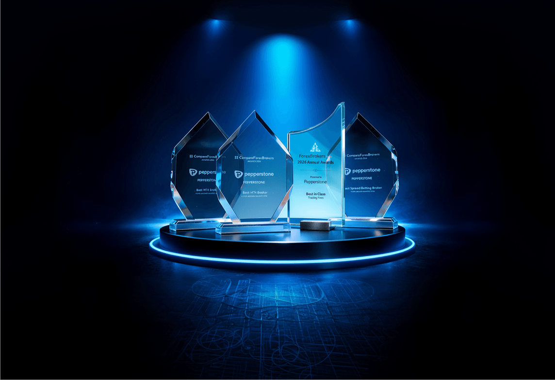 Pepperstone industry award trophies displayed on a lit podium