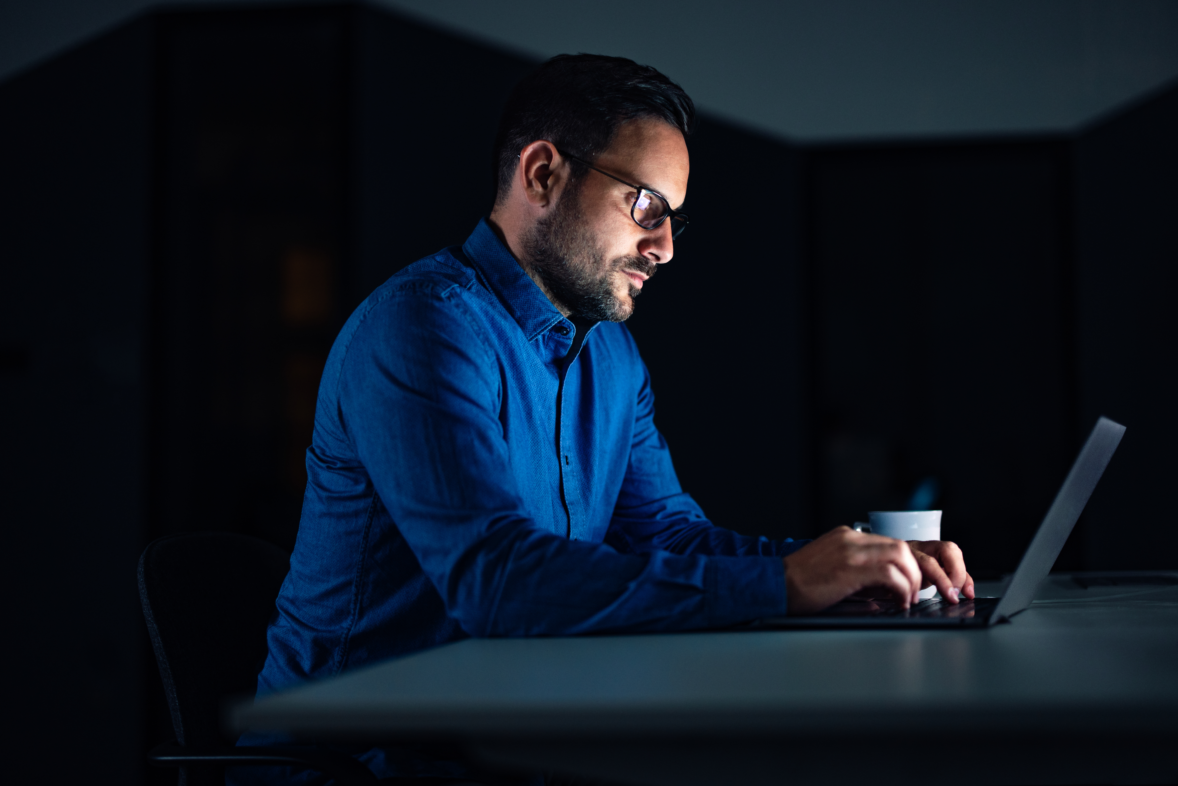 businessman-dressed-in-a-blue-shirt-working-over-2026-03-27-00-55-16-utc 1.png