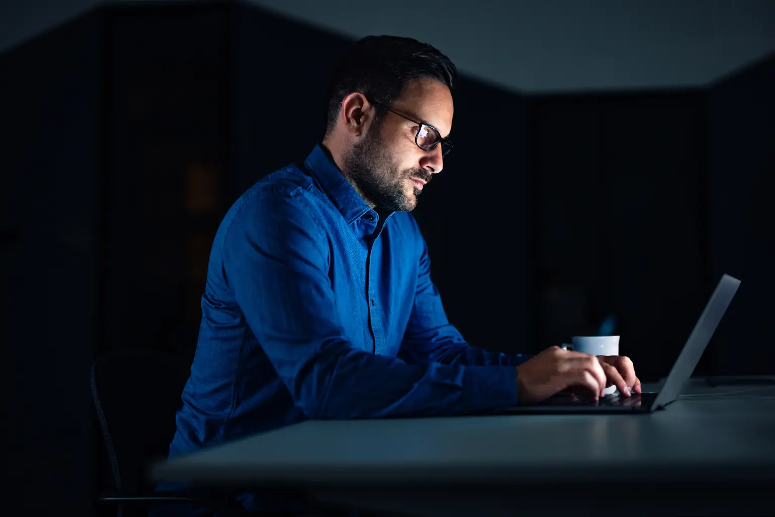 businessman-dressed-in-a-blue-shirt-working-over-2026-03-27-00-55-16-utc 1.png