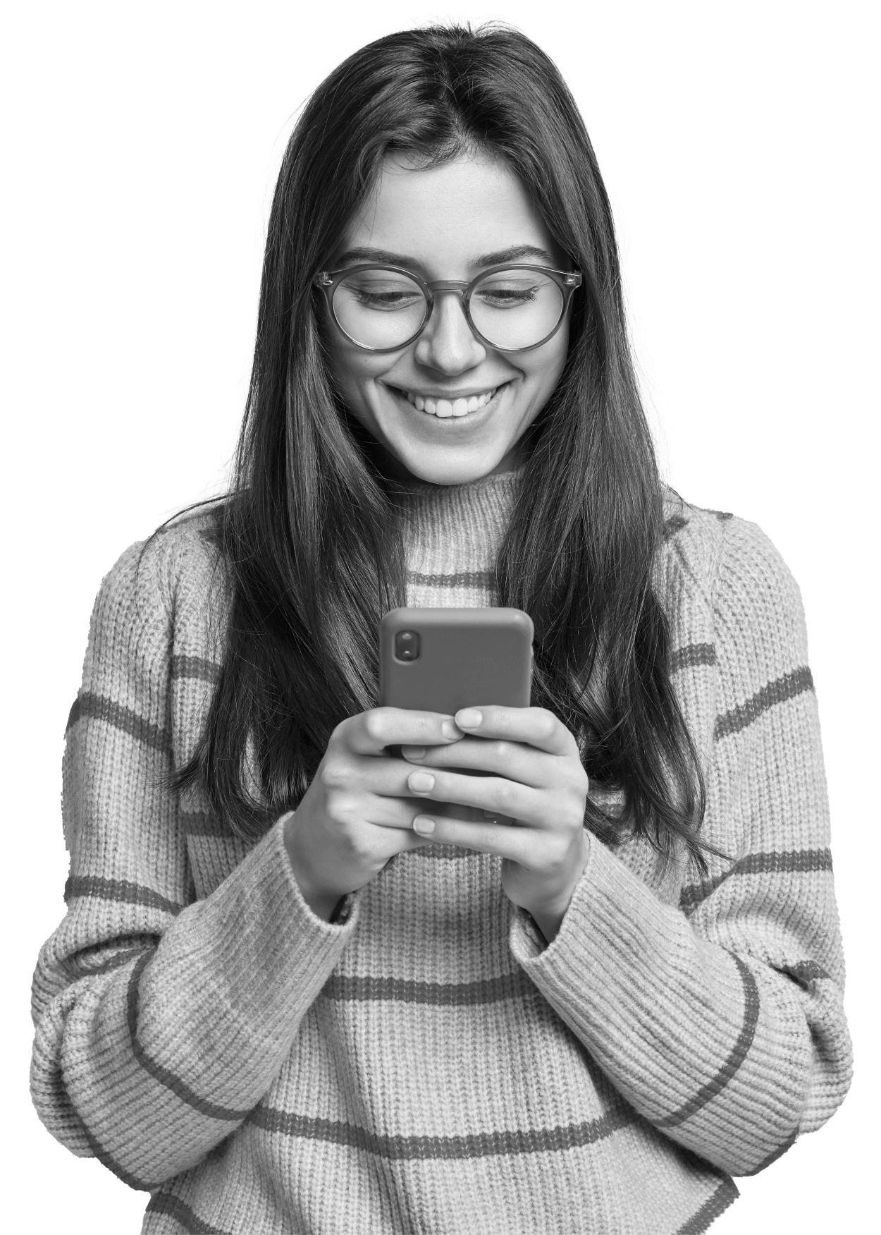 A person in glasses and a striped sweater smiling at their phone.