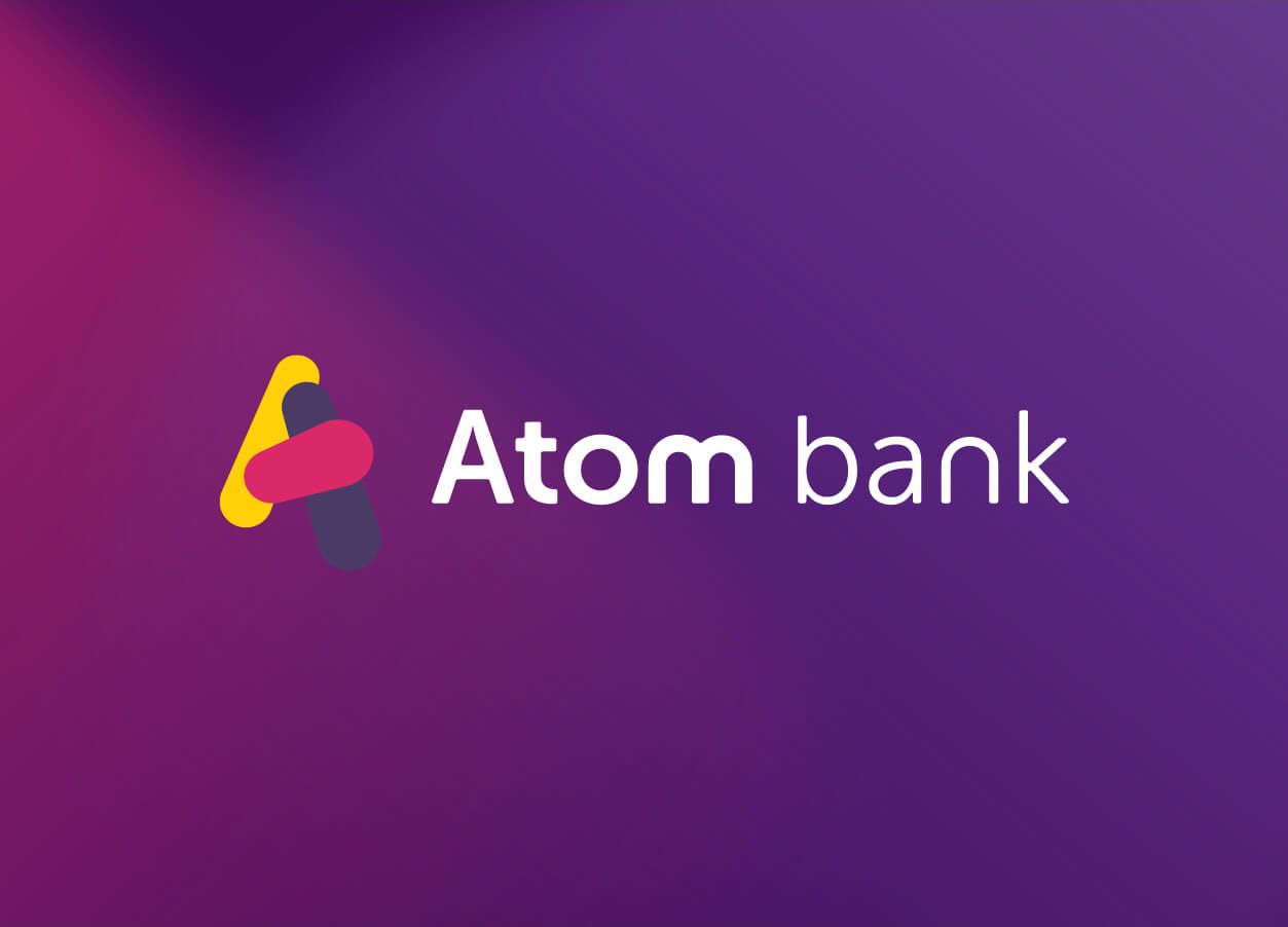 Atom logo on top of a graphic coloured background