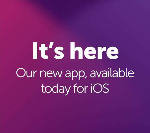 Phone displaying the Atom bank app home page with the words 'It's here, Our new app available today for IOS, coming soon to Google Play'