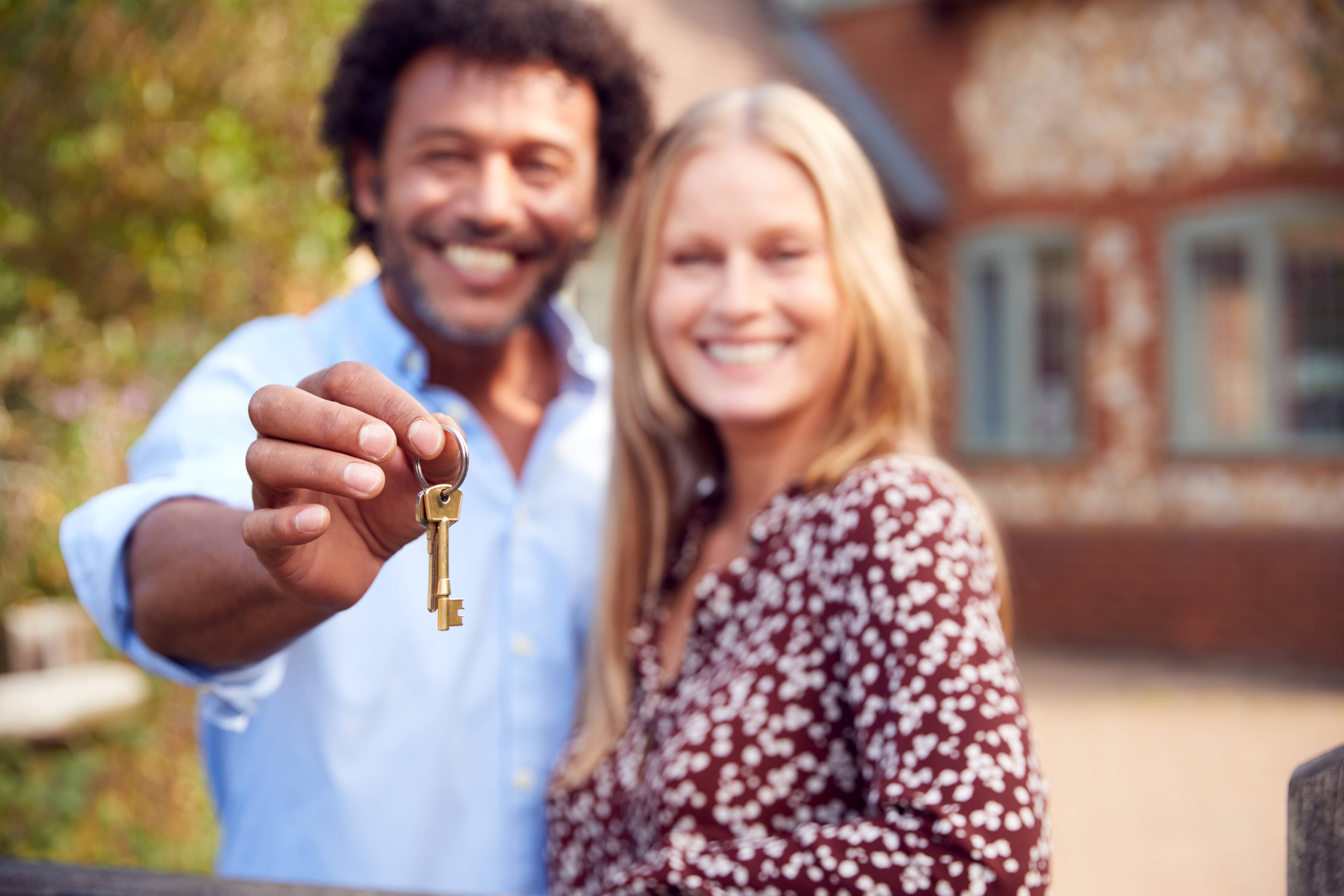 man and woman excited to move in together