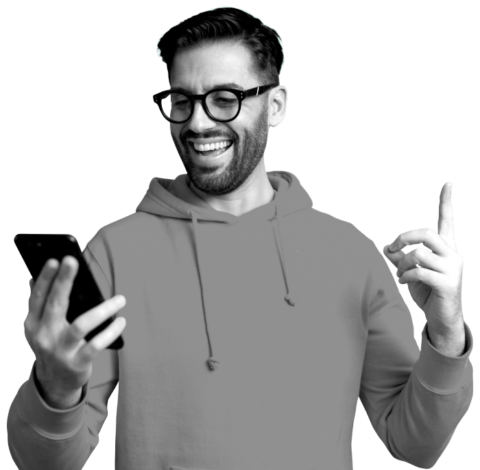 Person happily looks at phone, pointing their finger upwards