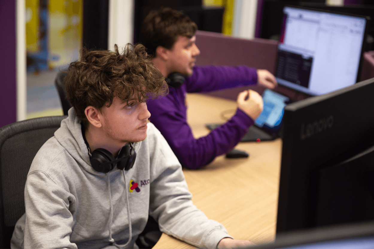 two men working at their desks