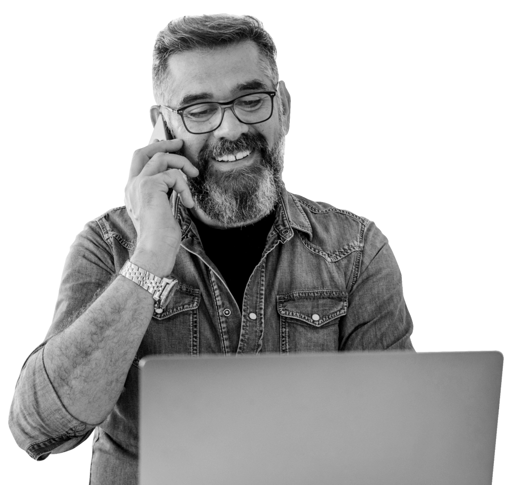 Man in denim shirt on laptop