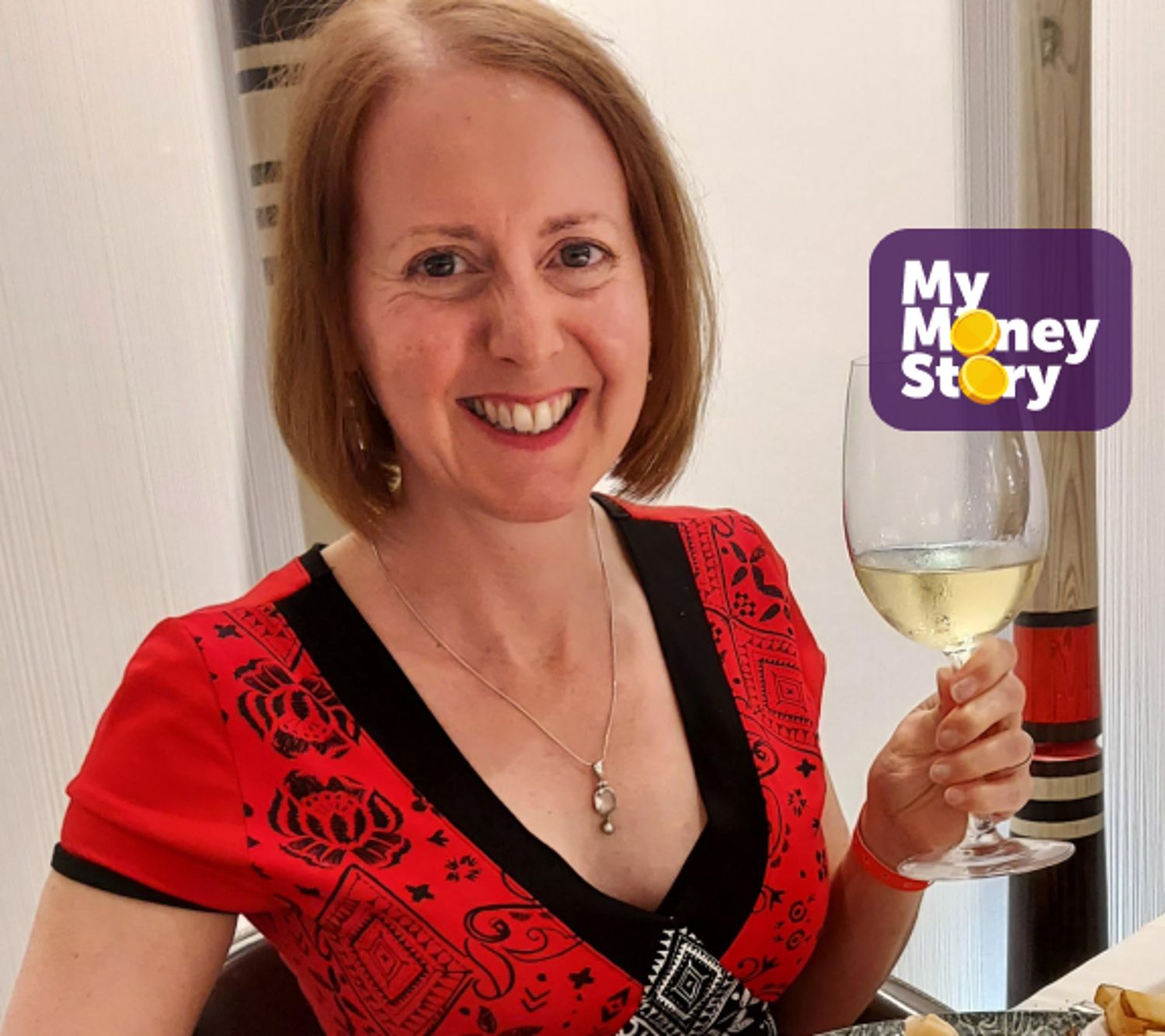 Lady holds glass of wine