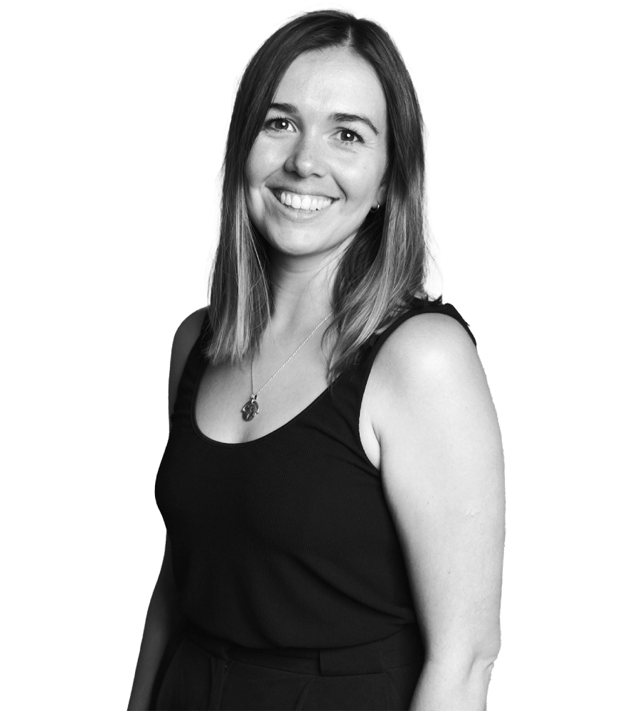 Woman in vest smiling
