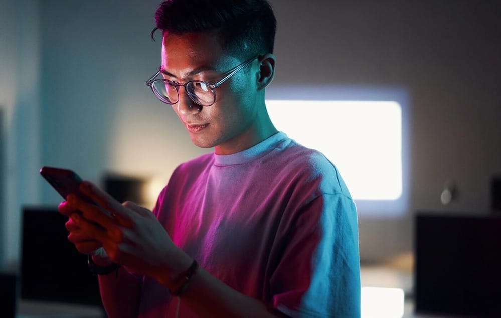 A man looking at his phone