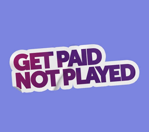 Man holding out a phone that says 'High Street Banks 0.975 AER'. A sticker behind him says 'Get Paid Not Played' 