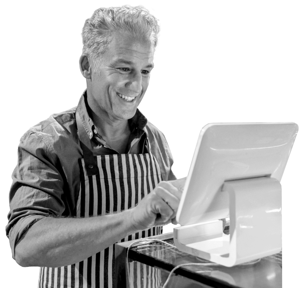Business owner, using an IPad to make a transaction