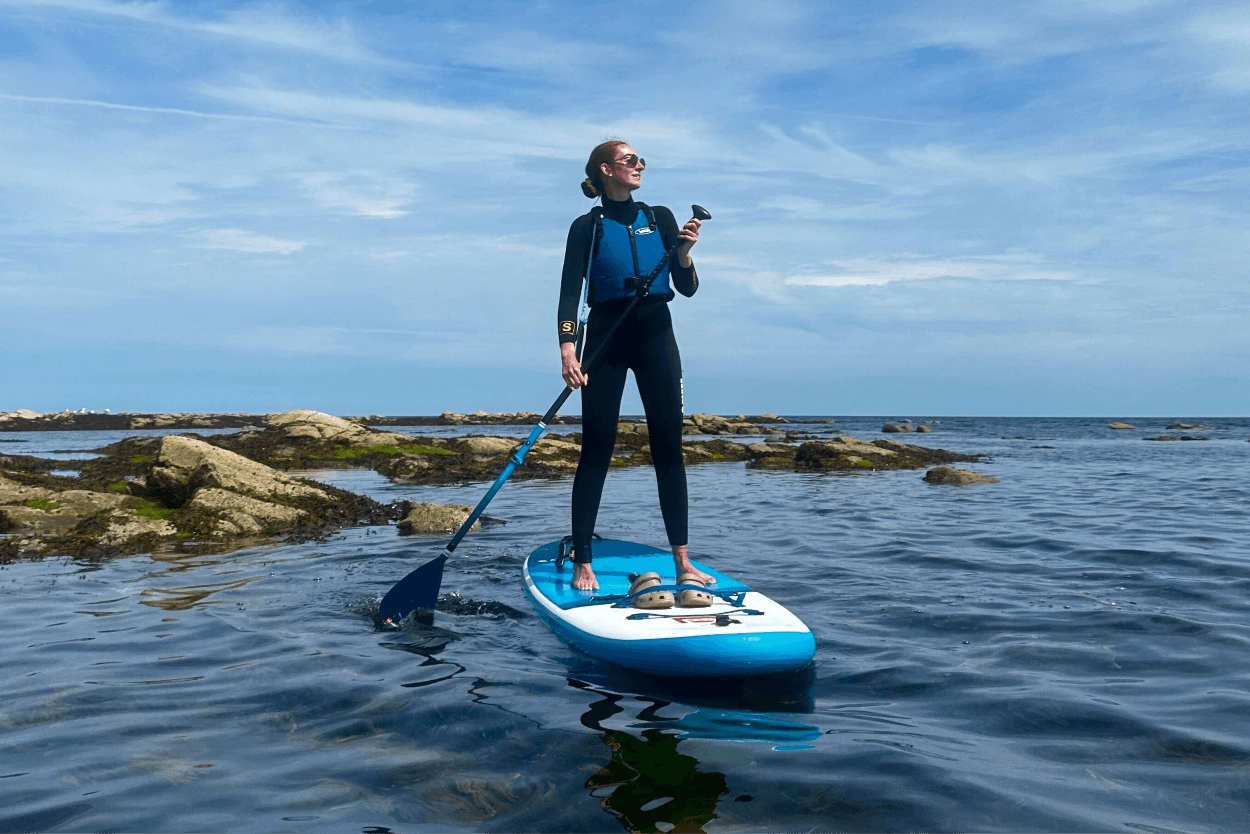 Woman in the sea on a paddleboard
