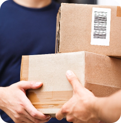 A delivery of boxes is being handed over