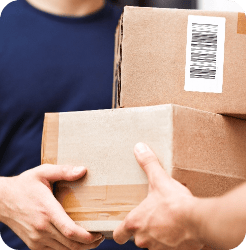 A delivery of boxes is being handed over