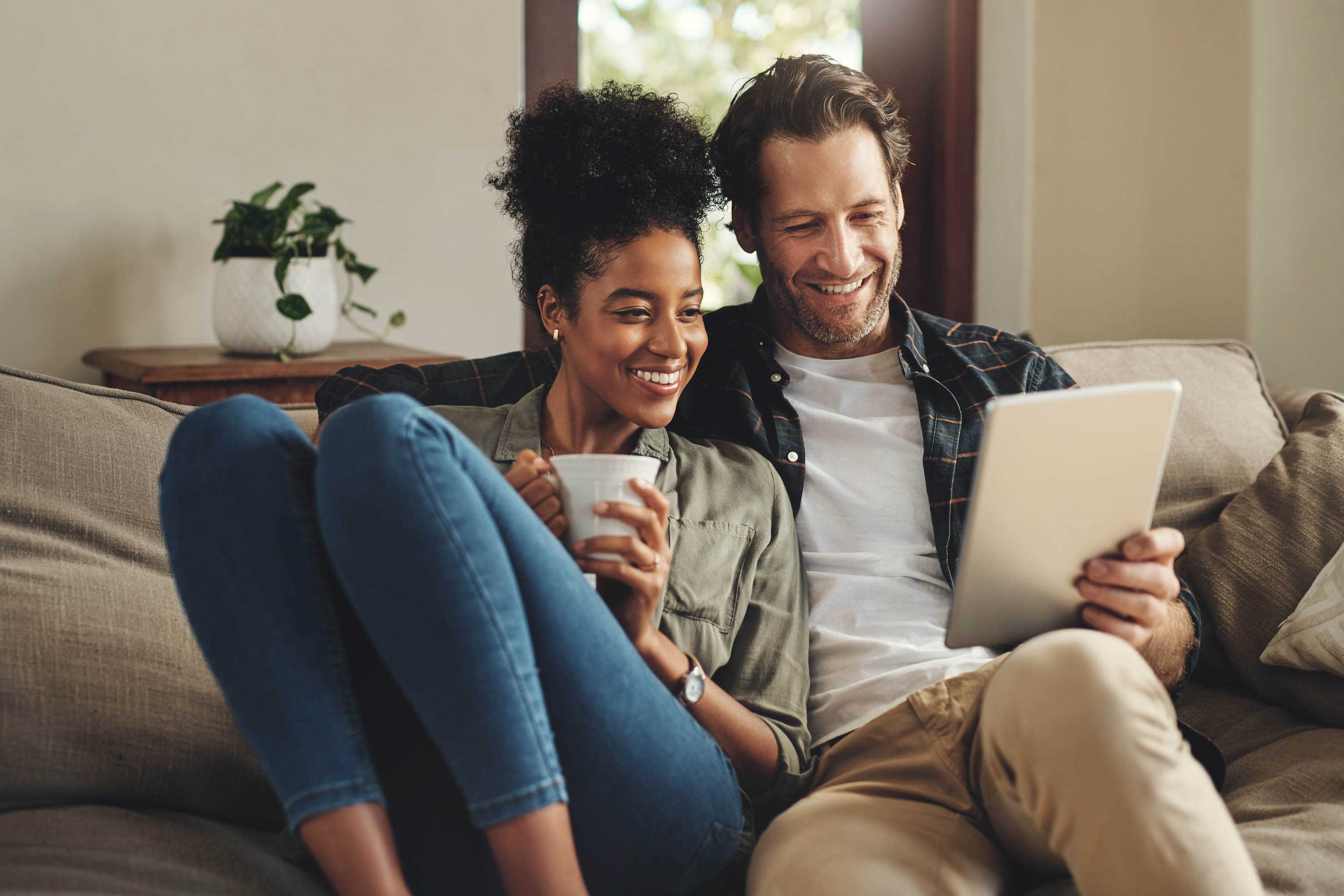 couple looking at ipad