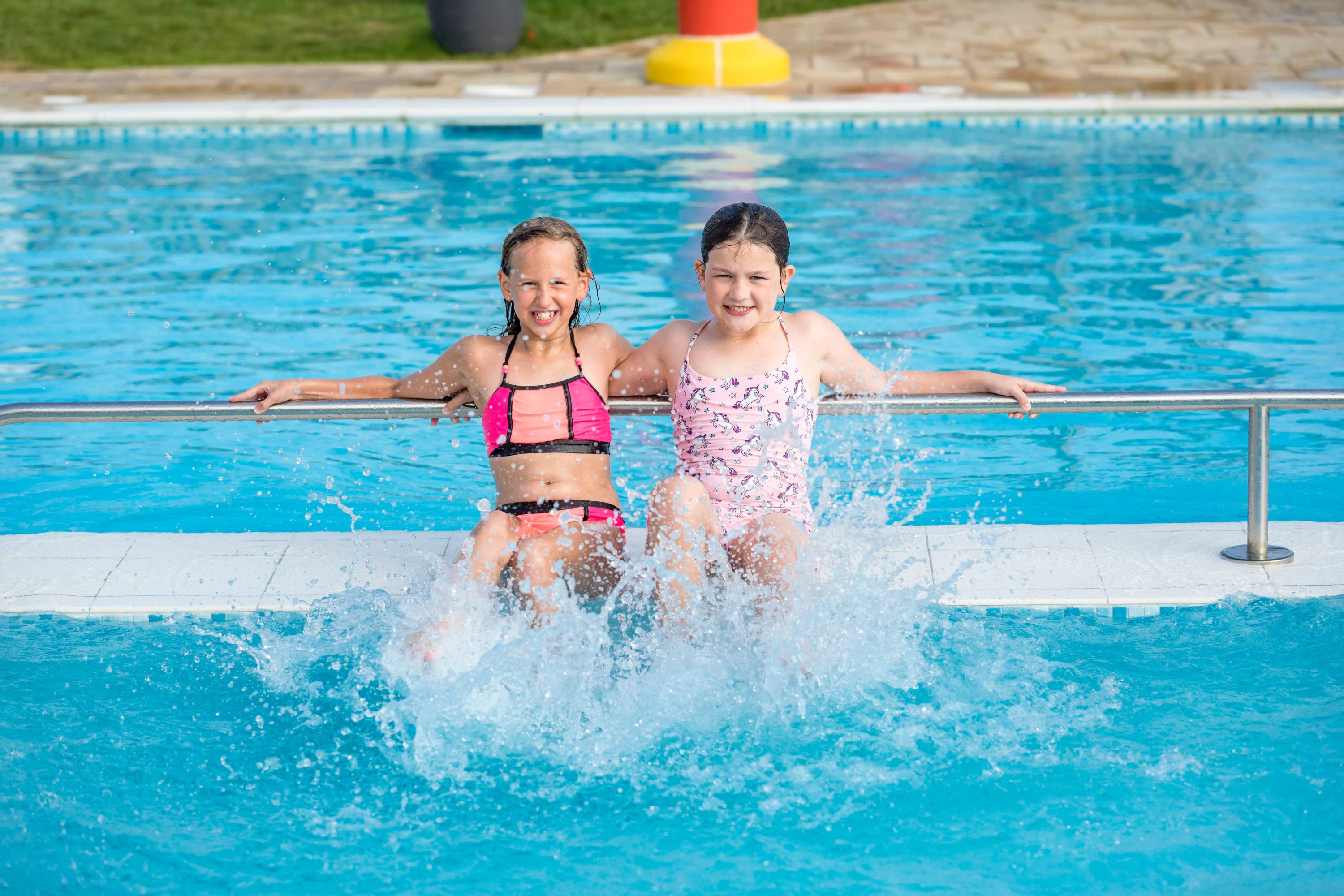 Children in the outdoor swimming pool