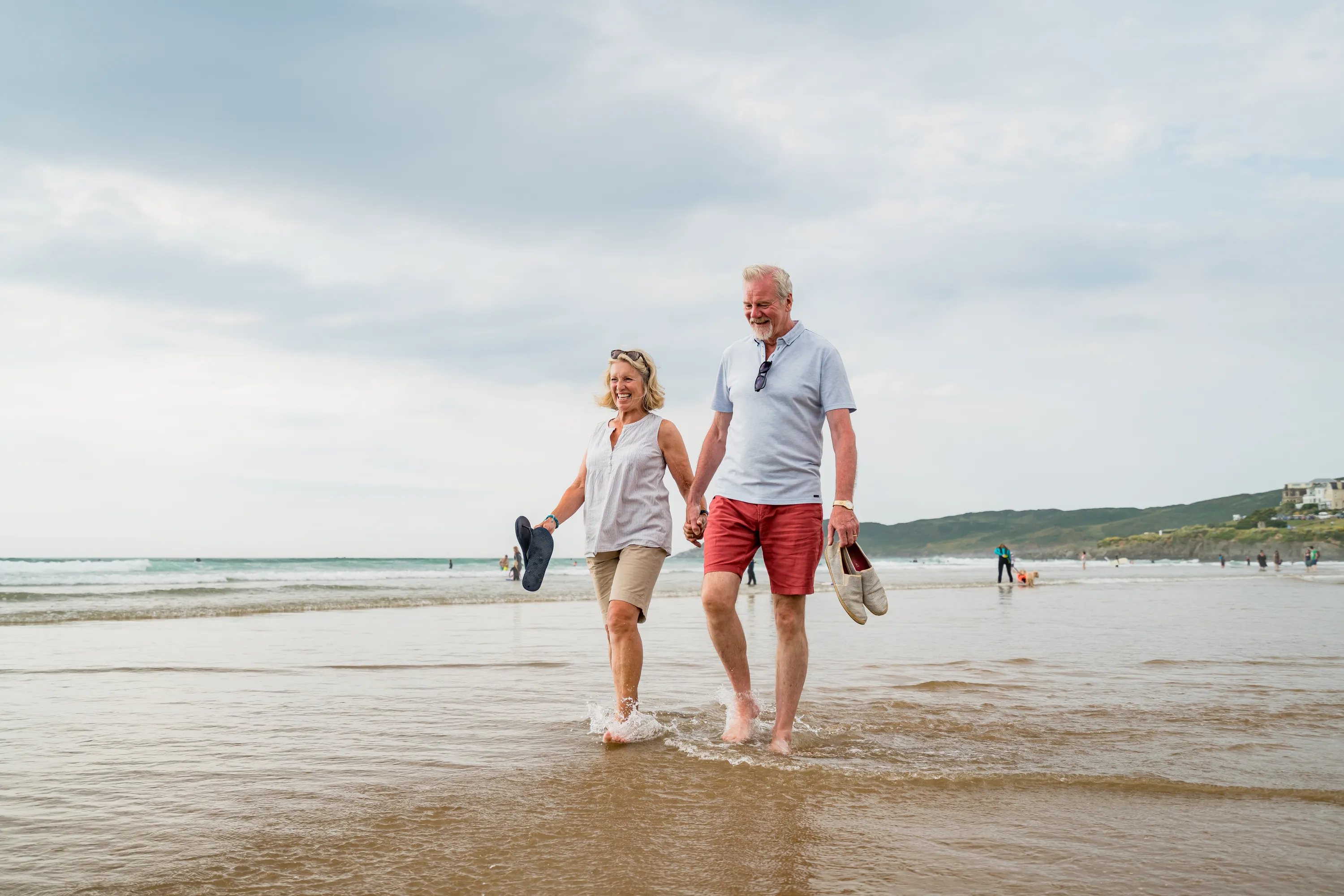DAT-2023_Devon_Tarka_Models_mature_couple_Walking_shoreline_Local_Area_Saunton_Sands (17).webp