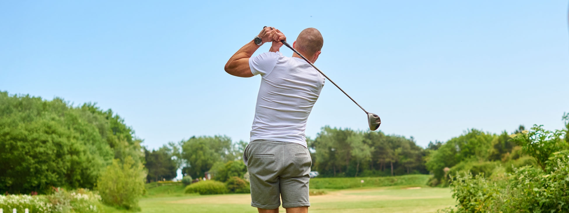 Man playing golf
