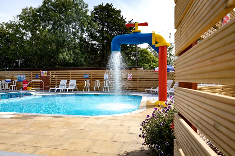 Outdoor swimming pool giant tap